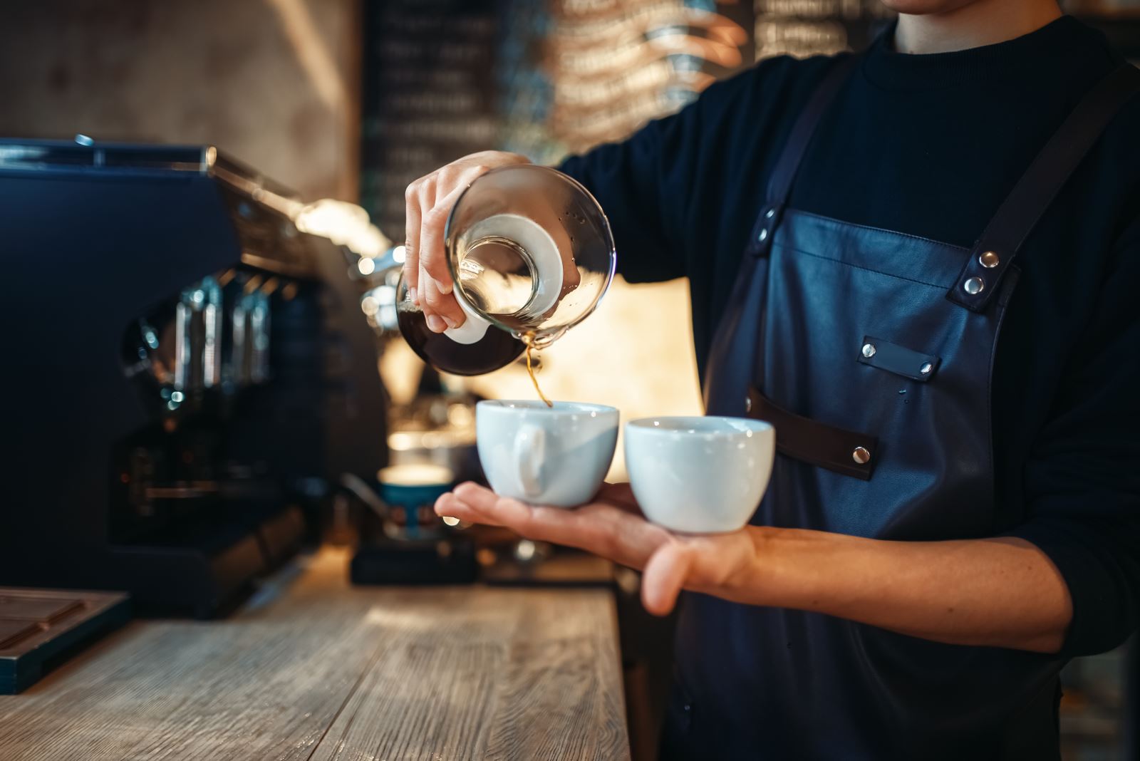 Barista pouring a coffee
